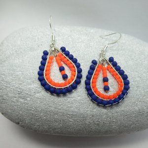 Blue and orange hand stitched earrings